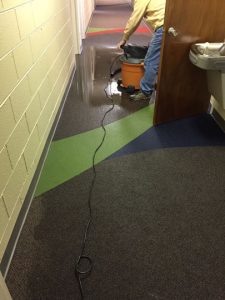 About RapidRestore24: crew drying a major church water loss