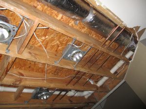 Water damage in Brookhaven: a pipe break in a ceiling