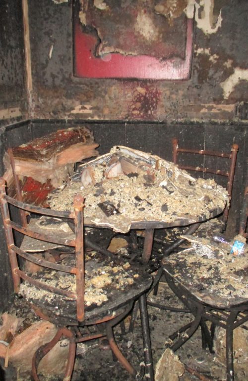 Smoke and fire damage inside a room